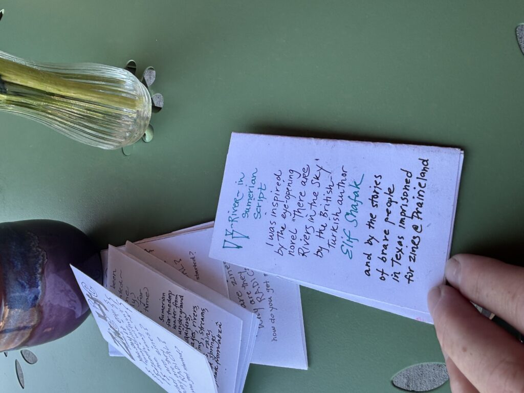 the back of a zine with an inspiration from the amazing novel, there are rivers in the sky, by Turkish British author elif shafak
